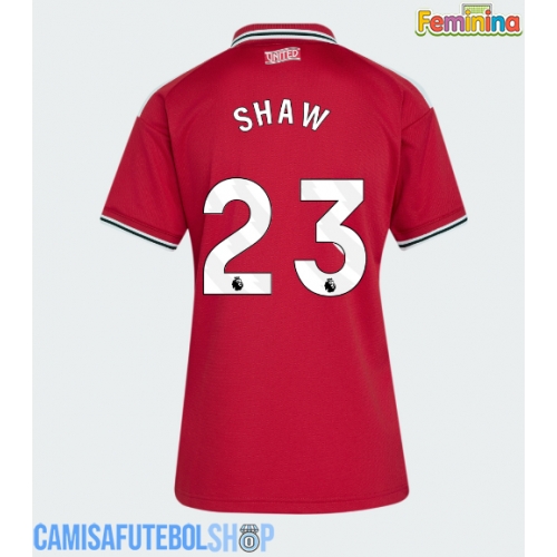 Camisa de time de futebol Manchester United Luke Shaw #23 Replicas 1º Equipamento Feminina 2026-27 Manga Curta